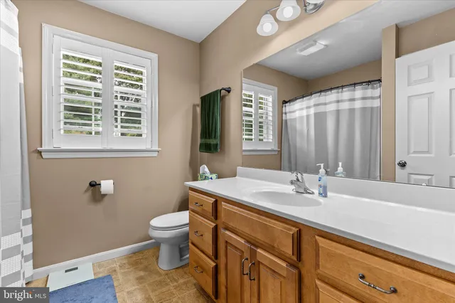 a view of a workspace with lots of gym equipment