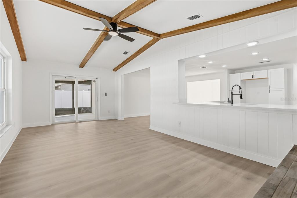 1985 Japonica Road Winter Park, FL 32792 - Photo 12 of 51 a view of a livingroom with a ceiling fan