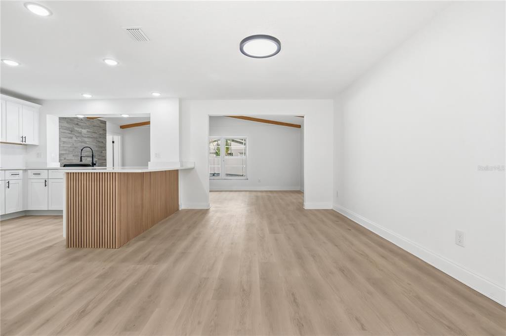 1985 Japonica Road Winter Park, FL 32792 - Photo 19 of 51 a view of kitchen with wooden floor and electronic appliances