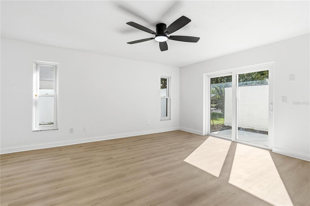 1985 Japonica Road Winter Park, FL 32792 - Photo 27 of 51 wooden floor in an empty room with a window
