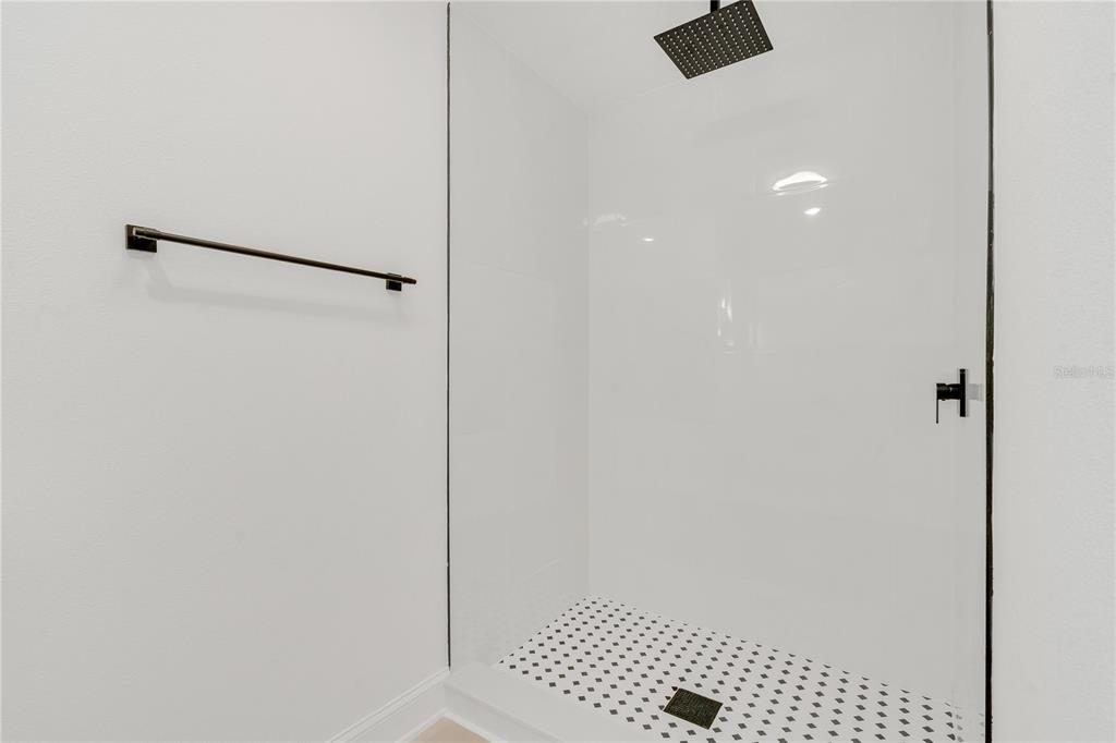 1985 Japonica Road Winter Park, FL 32792 - Photo 29 of 51 a bathroom with a shower