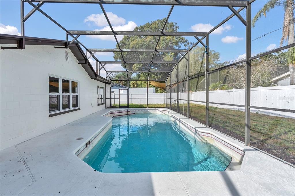 1985 Japonica Road Winter Park, FL 32792 - Photo 39 of 51 a swimming pool with a yard