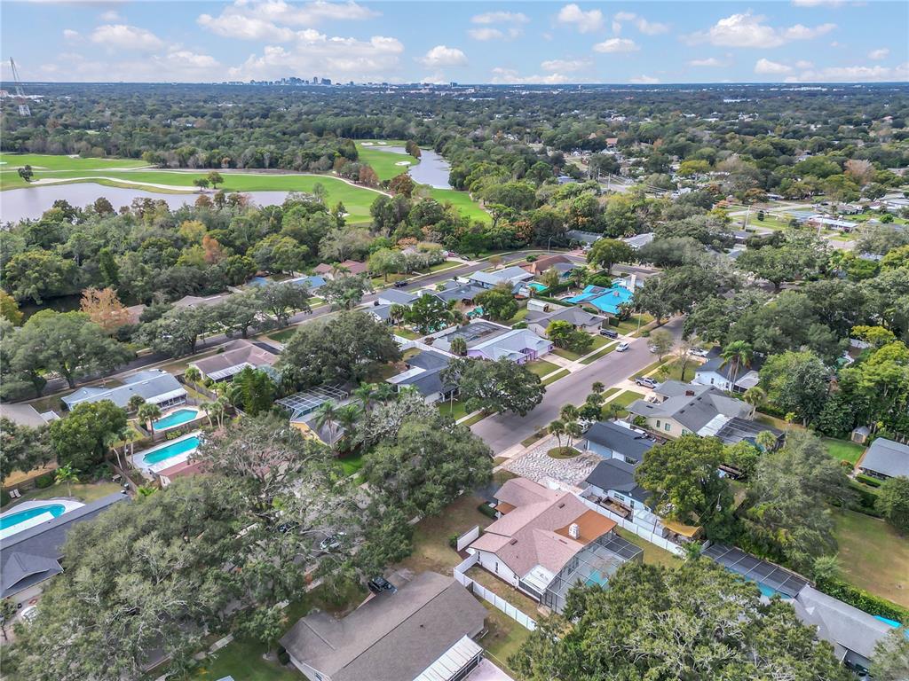 1985 Japonica Road Winter Park, FL 32792 - Photo 48 of 51 an aerial view of a city with lots of residential buildings and mountain view in back