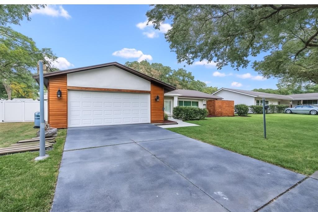 1985 Japonica Road Winter Park, FL 32792 - Photo 51 of 51 a front view of house with yard and green space
