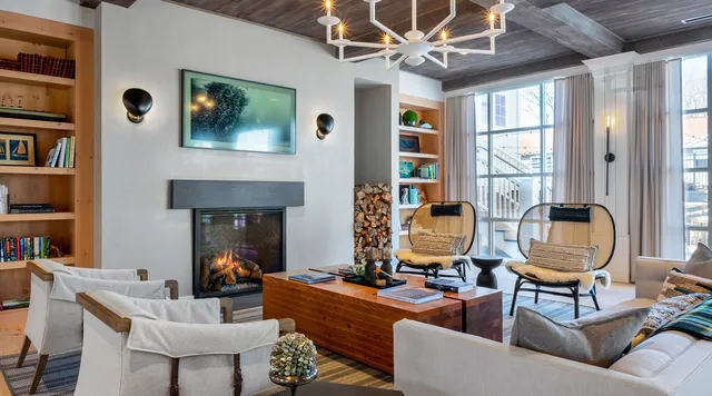 a view of a living room and dining room