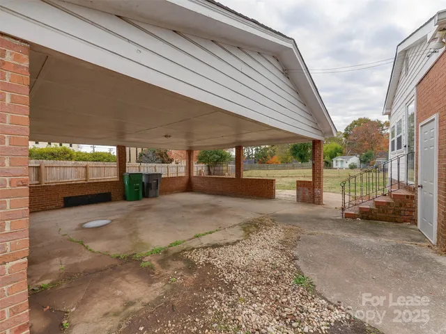 a view of backyard with green space