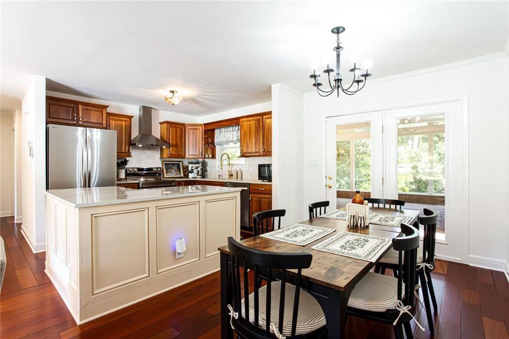 2814 Goodfellows Road Tucker, GA 30084 - Photo 19 of 46 a kitchen that has a table chairs and refrigerator