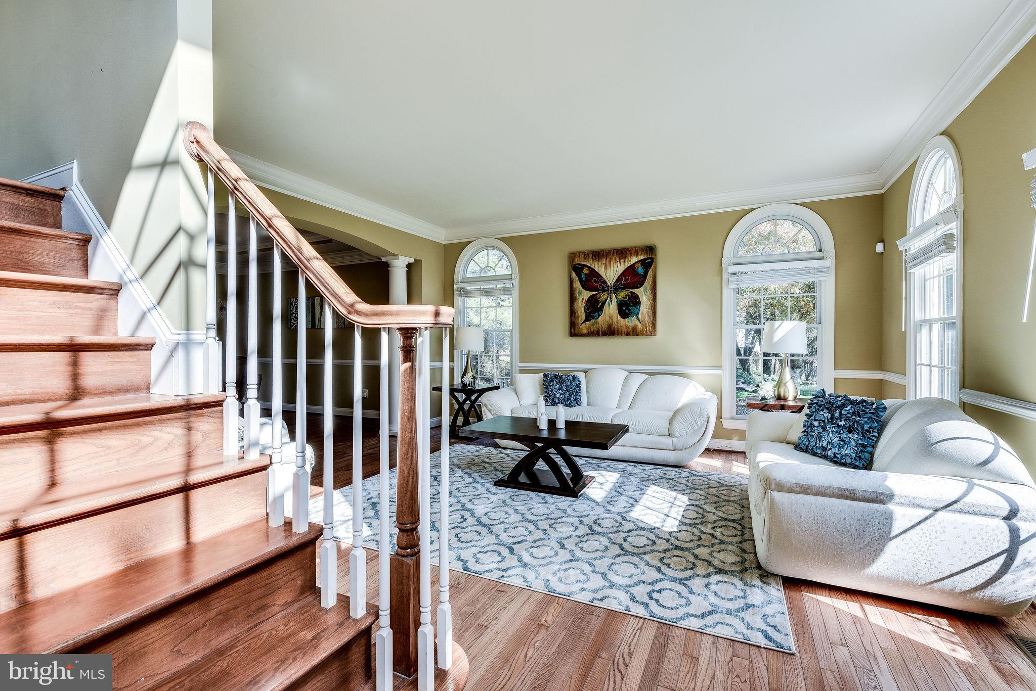 1701 Raleigh Hill Road Vienna, VA 22182 - Photo 18 of 61 a living room with furniture or wooden floor and a large window