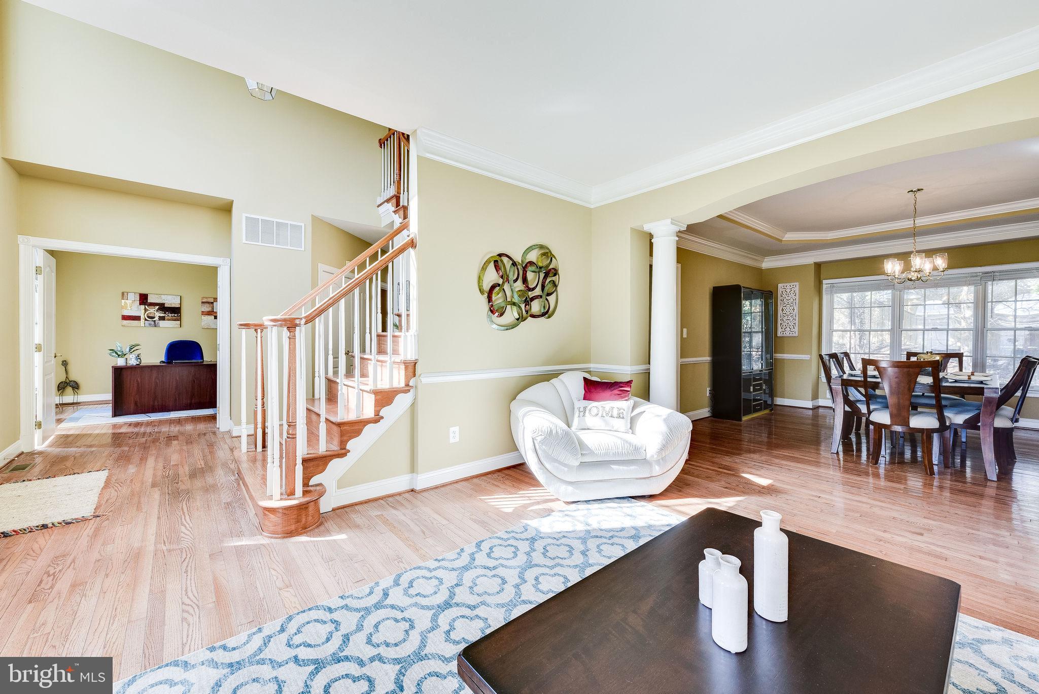 1701 Raleigh Hill Road Vienna, VA 22182 - Photo 20 of 61 a living room with furniture and a wooden floor