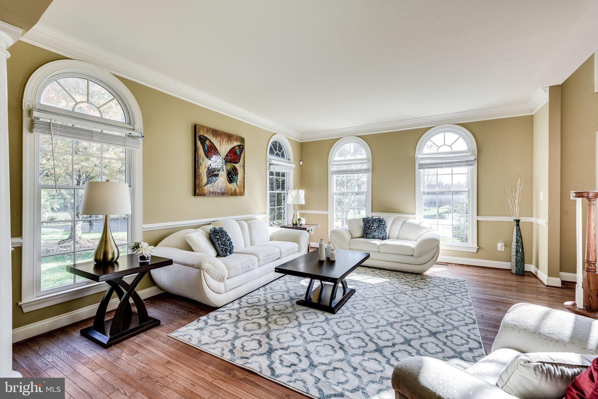 1701 Raleigh Hill Road Vienna, VA 22182 - Photo 22 of 61 a living room with furniture or couch and a large window