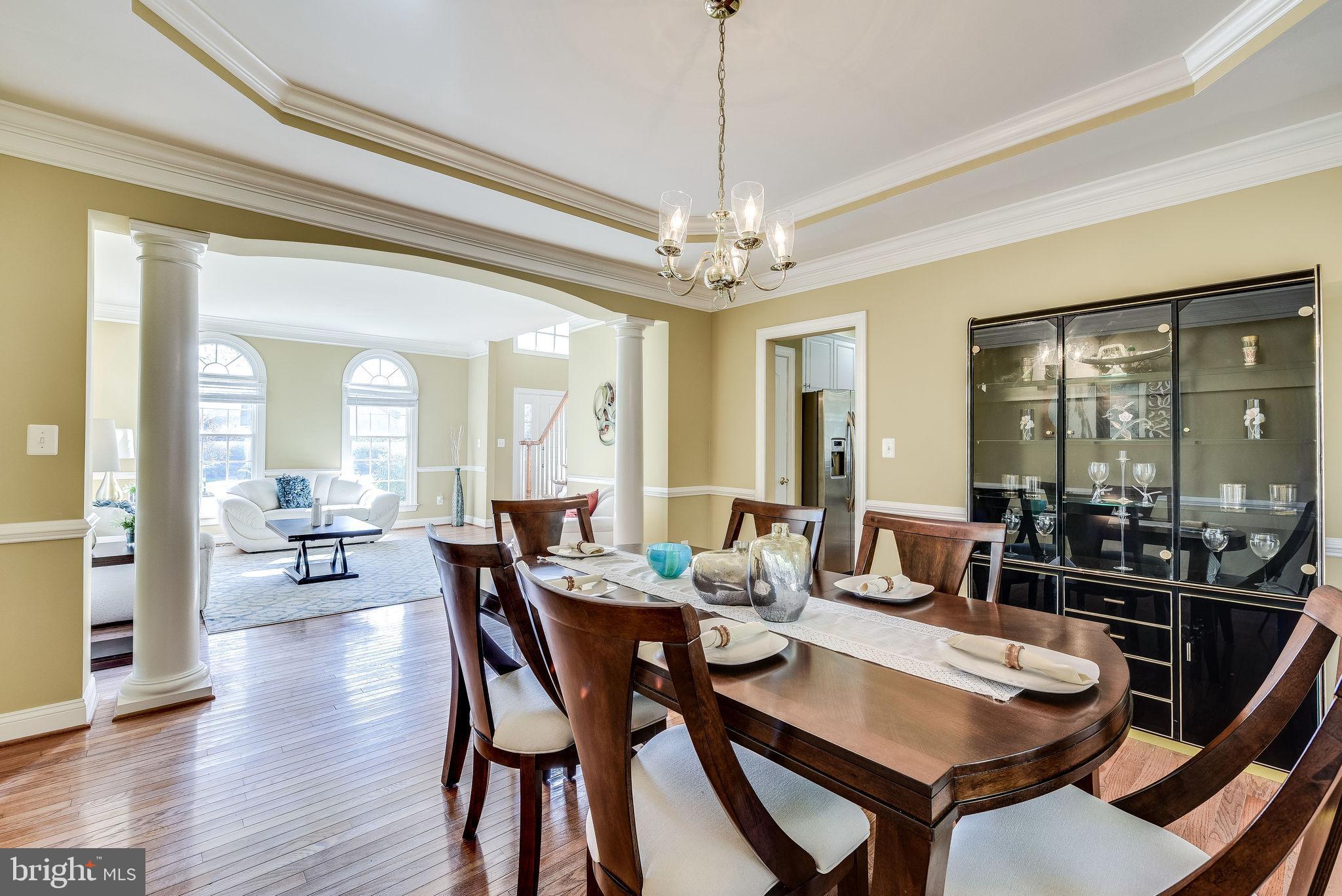 1701 Raleigh Hill Road Vienna, VA 22182 - Photo 24 of 61 a view of a dining room with furniture window and wooden floor