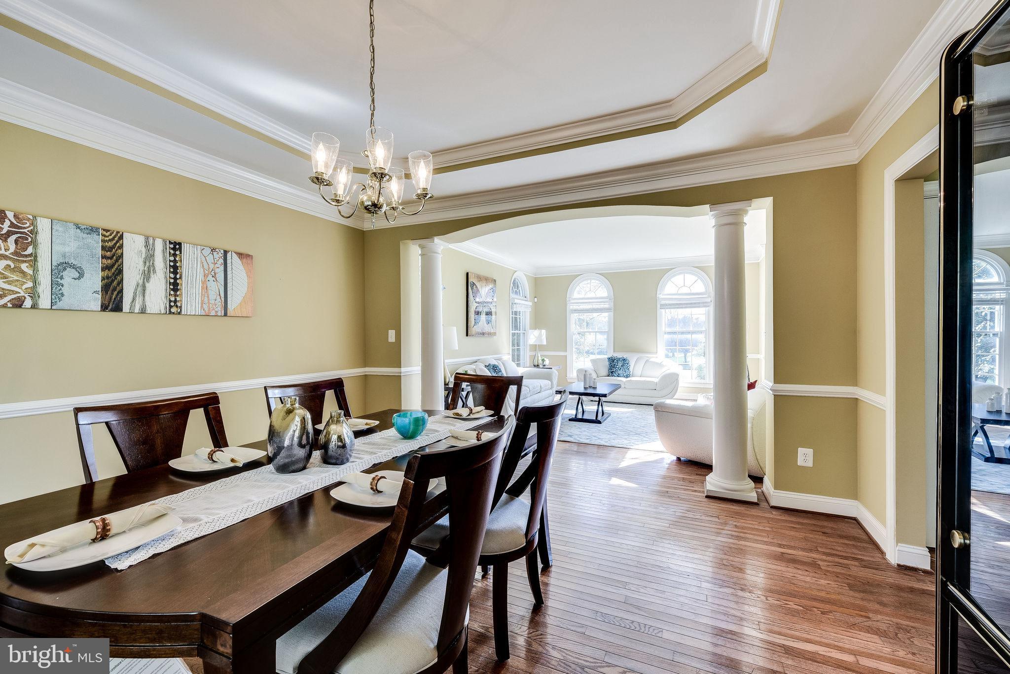 1701 Raleigh Hill Road Vienna, VA 22182 - Photo 25 of 61 a view of a dining room with furniture window and wooden floor