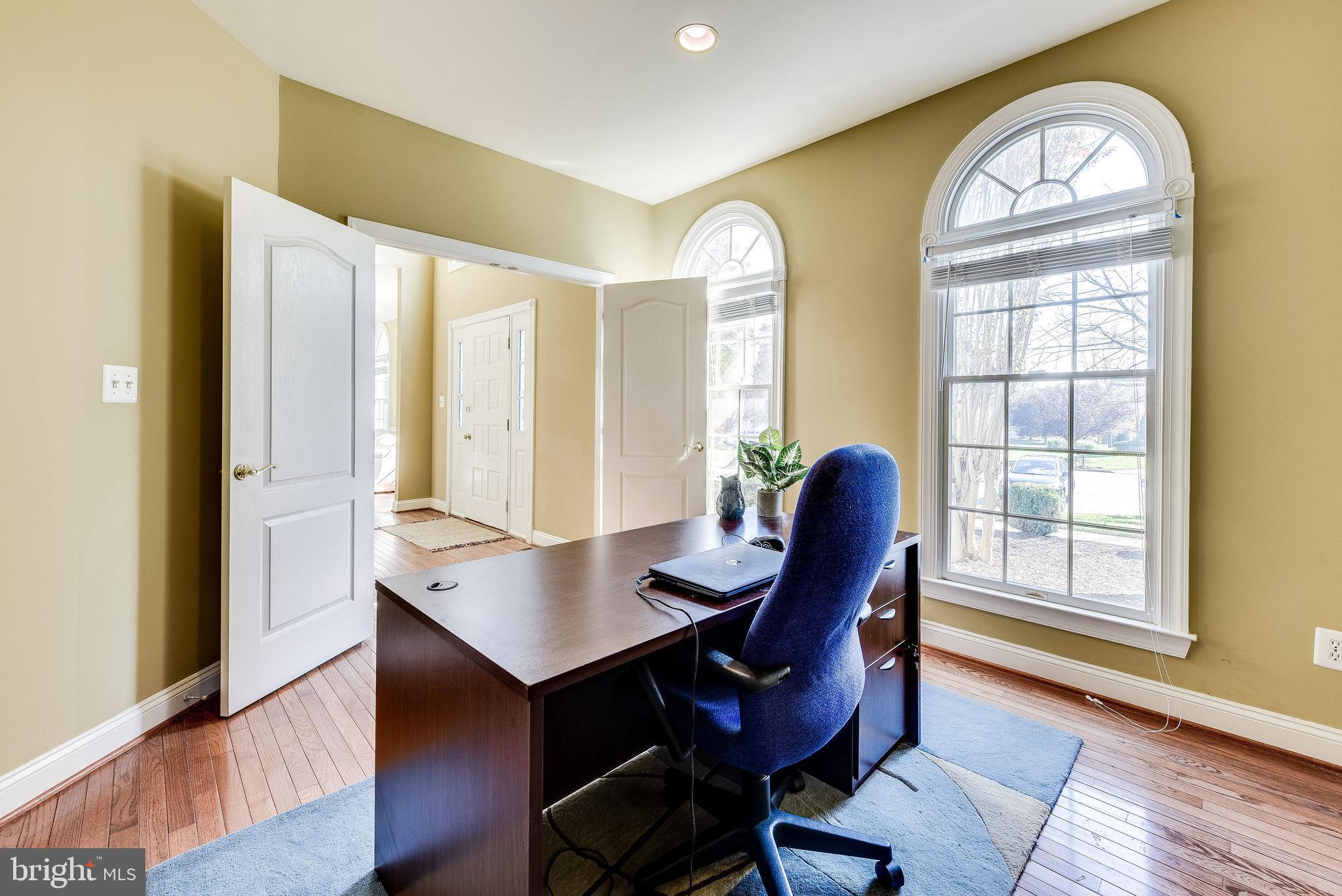 1701 Raleigh Hill Road Vienna, VA 22182 - Photo 28 of 61 a view of a livingroom with furniture and wooden floor