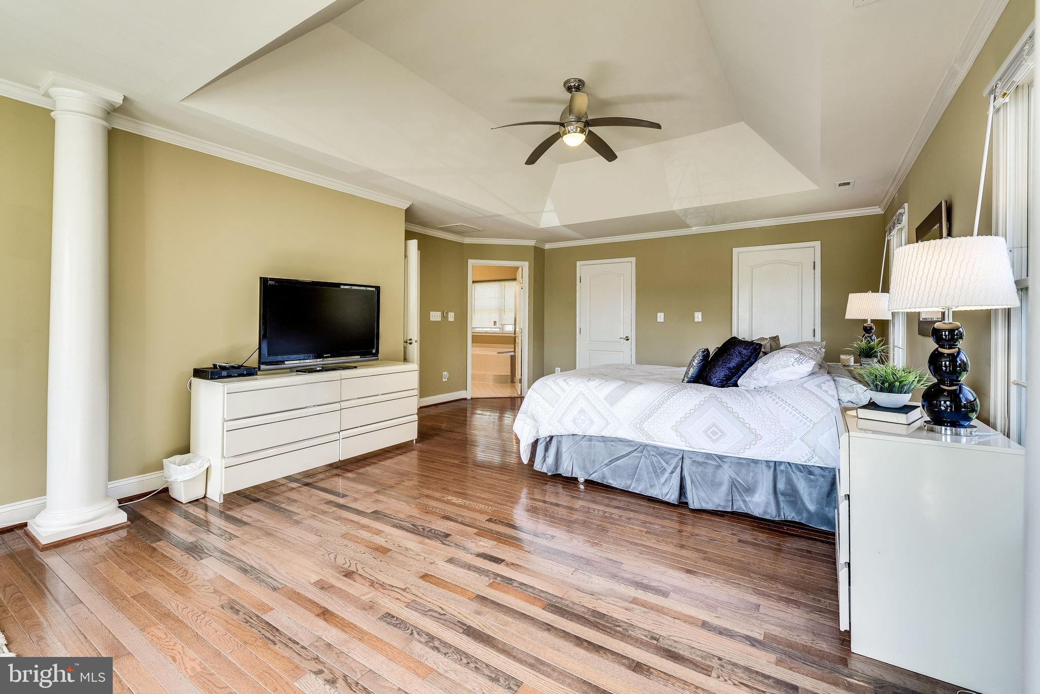 1701 Raleigh Hill Road Vienna, VA 22182 - Photo 31 of 61 a bedroom with a bed and a flat screen tv