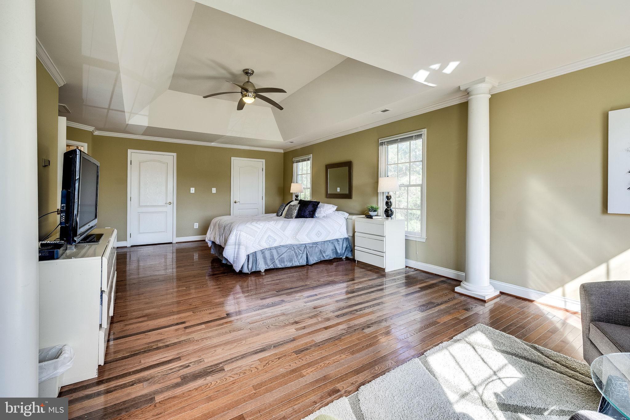 1701 Raleigh Hill Road Vienna, VA 22182 - Photo 32 of 61 a bedroom with a bed and a flat screen tv