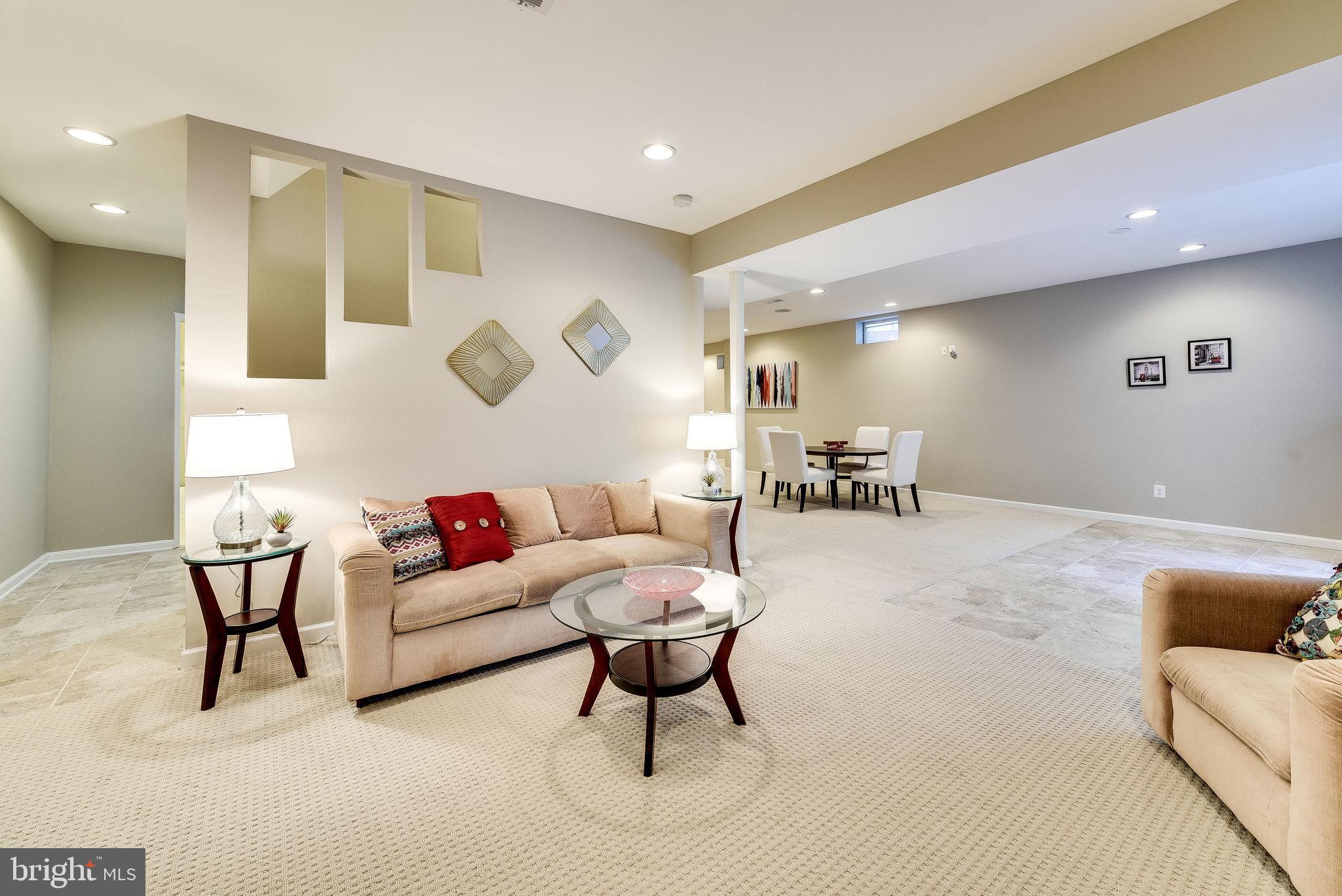 1701 Raleigh Hill Road Vienna, VA 22182 - Photo 54 of 61 a living room with furniture and a large window