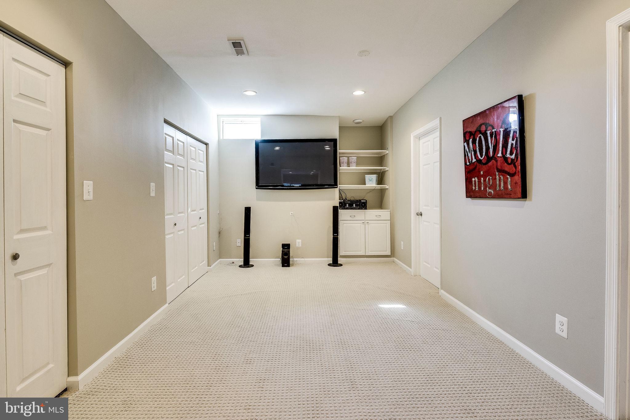 1701 Raleigh Hill Road Vienna, VA 22182 - Photo 55 of 61 a view of a livingroom with a flat screen tv