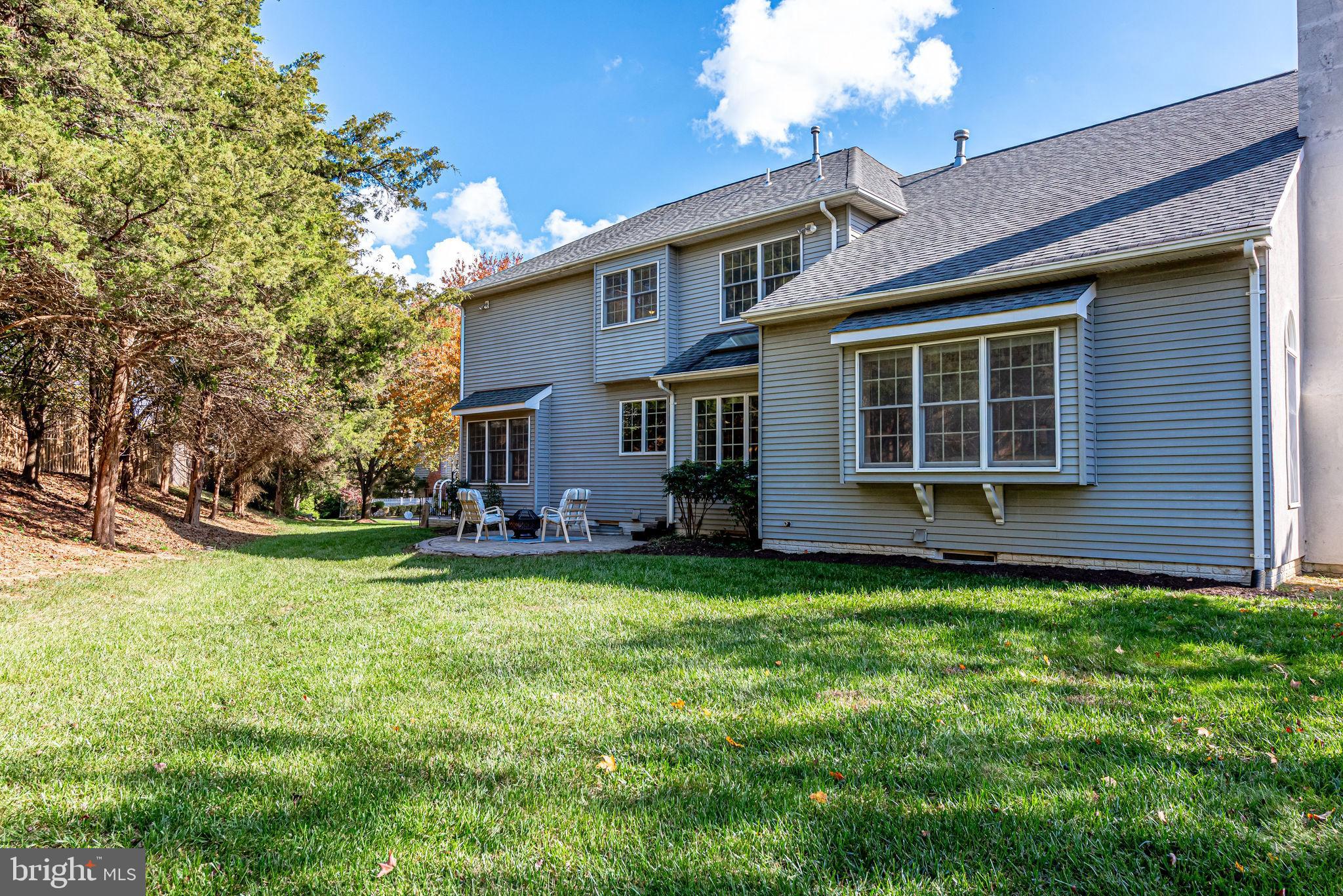 1701 Raleigh Hill Road Vienna, VA 22182 - Photo 59 of 61 a view of a house with a backyard