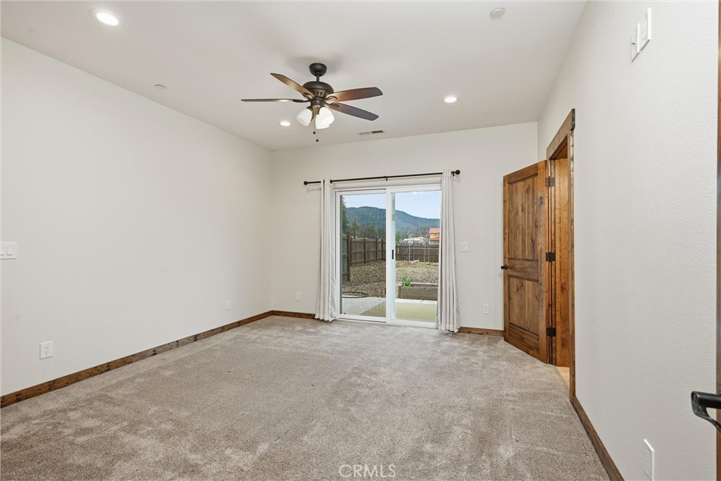 21060 Santa Clara Road Middletown, CA 95461 - Photo 11 of 21 a view of an empty room with a window