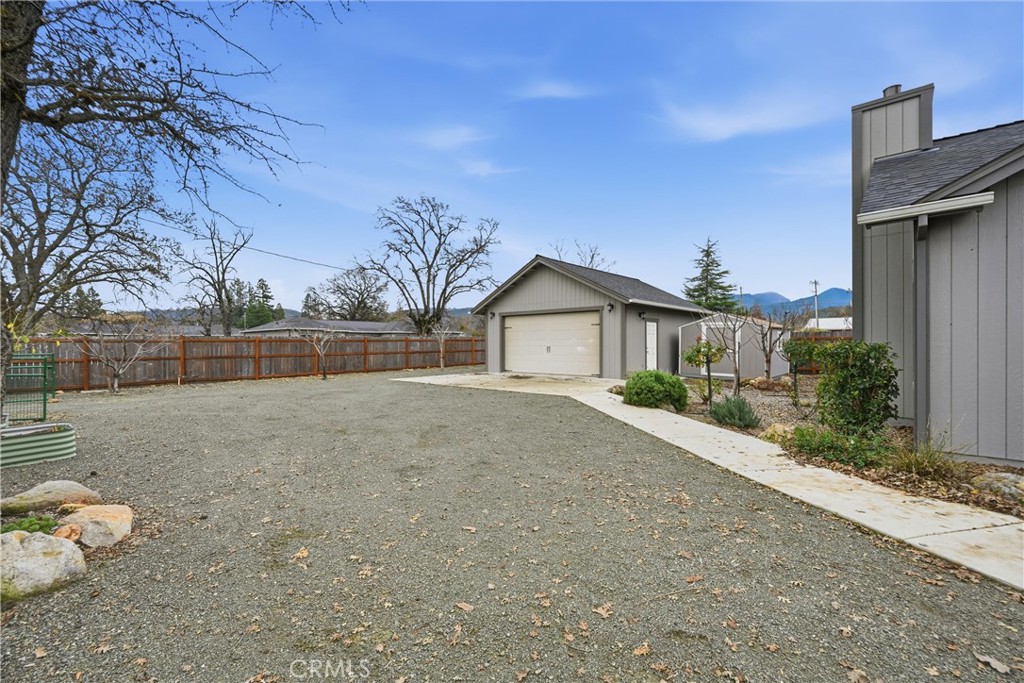 21060 Santa Clara Road Middletown, CA 95461 - Photo 20 of 21 a front view of a house with a yard