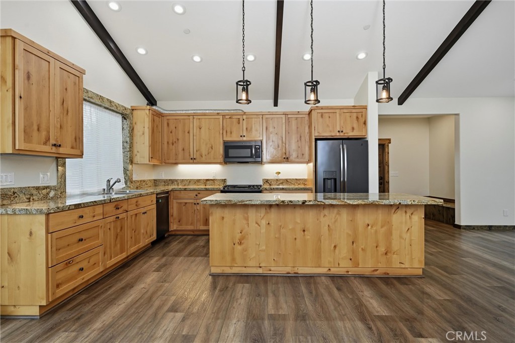 21060 Santa Clara Road Middletown, CA 95461 - Photo 7 of 21 a kitchen with stainless steel appliances granite countertop a sink a stove and a wooden floors