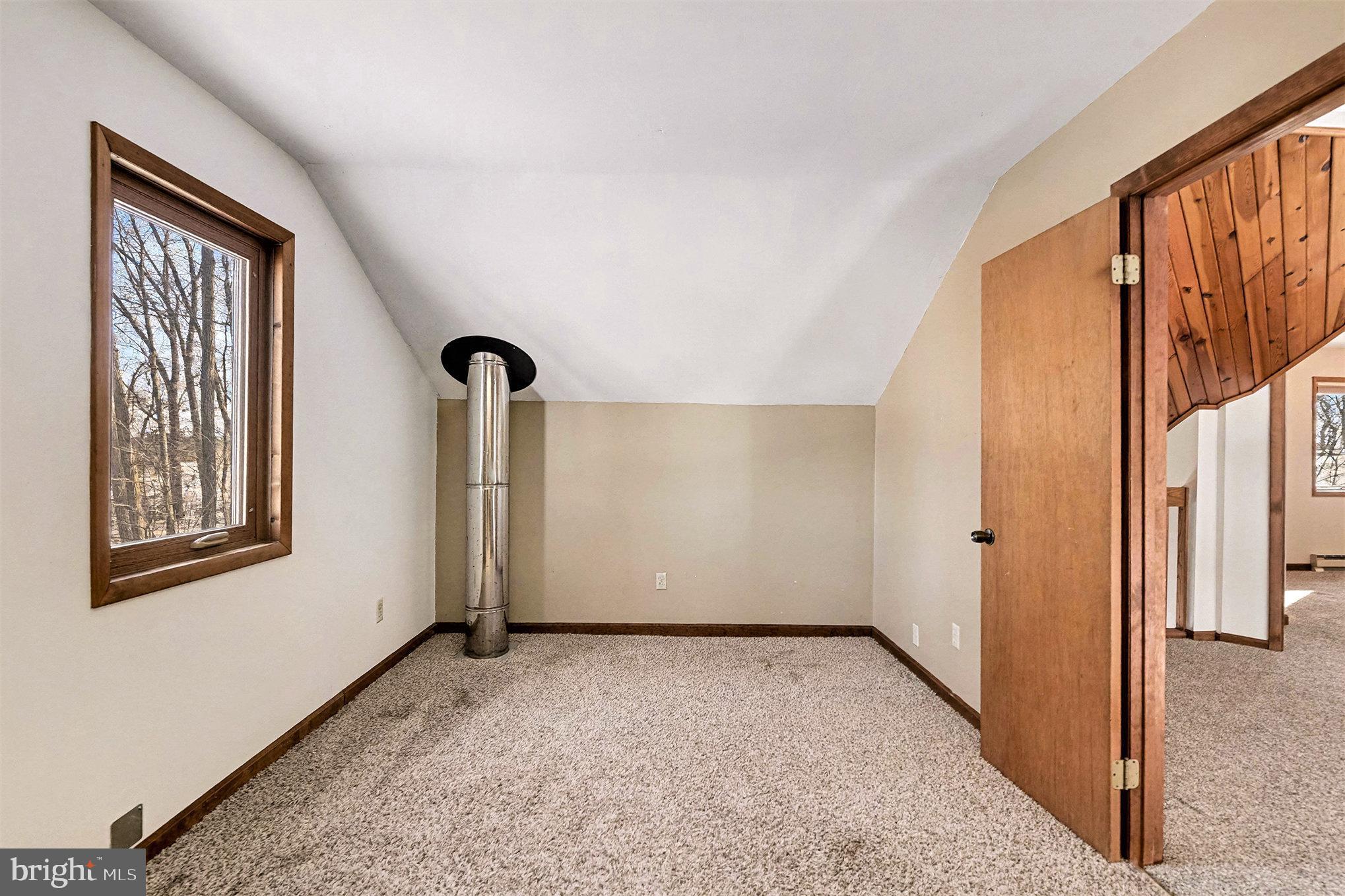 4007 Street Road Street, MD 21154 - Photo 29 of 42 Upper Level Bedroom #3 (insulated stove pipe)