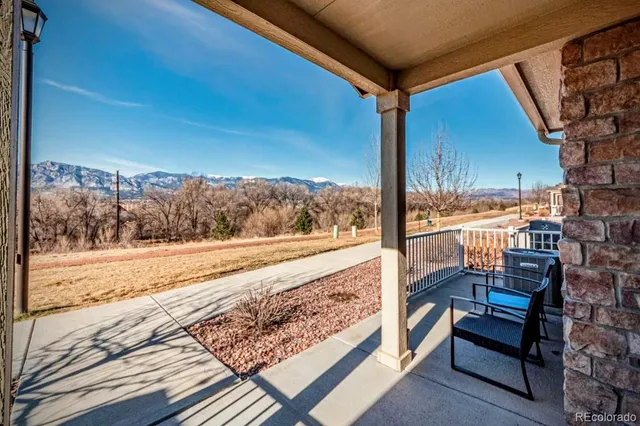 a view of a balcony and yard