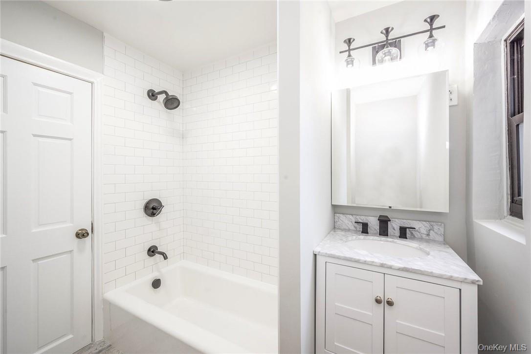 64 Kensington Road, Unit 2C Bronxville, NY 10708 - Photo 17 of 20 Updated Bathroom