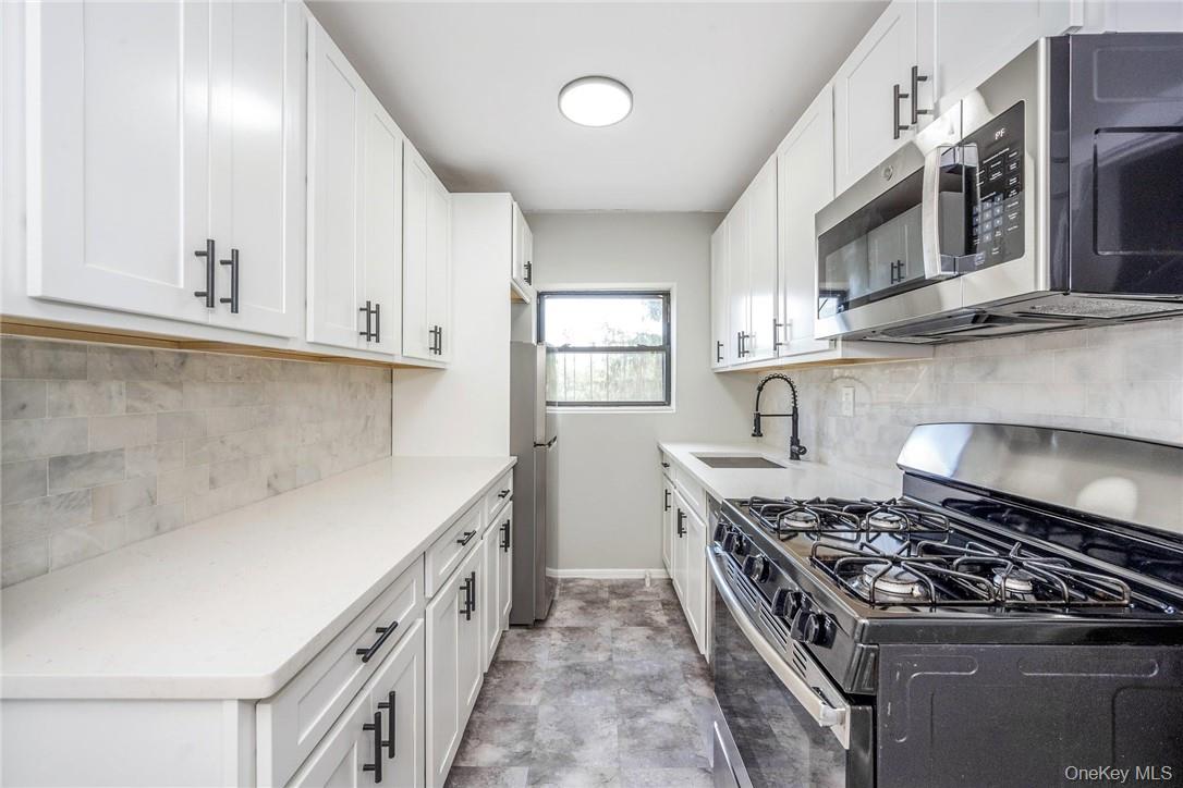 64 Kensington Road, Unit 2C Bronxville, NY 10708 - Photo 2 of 20 Updated Kitchen W/Quartz Countertops & Stainless Steel Appliances