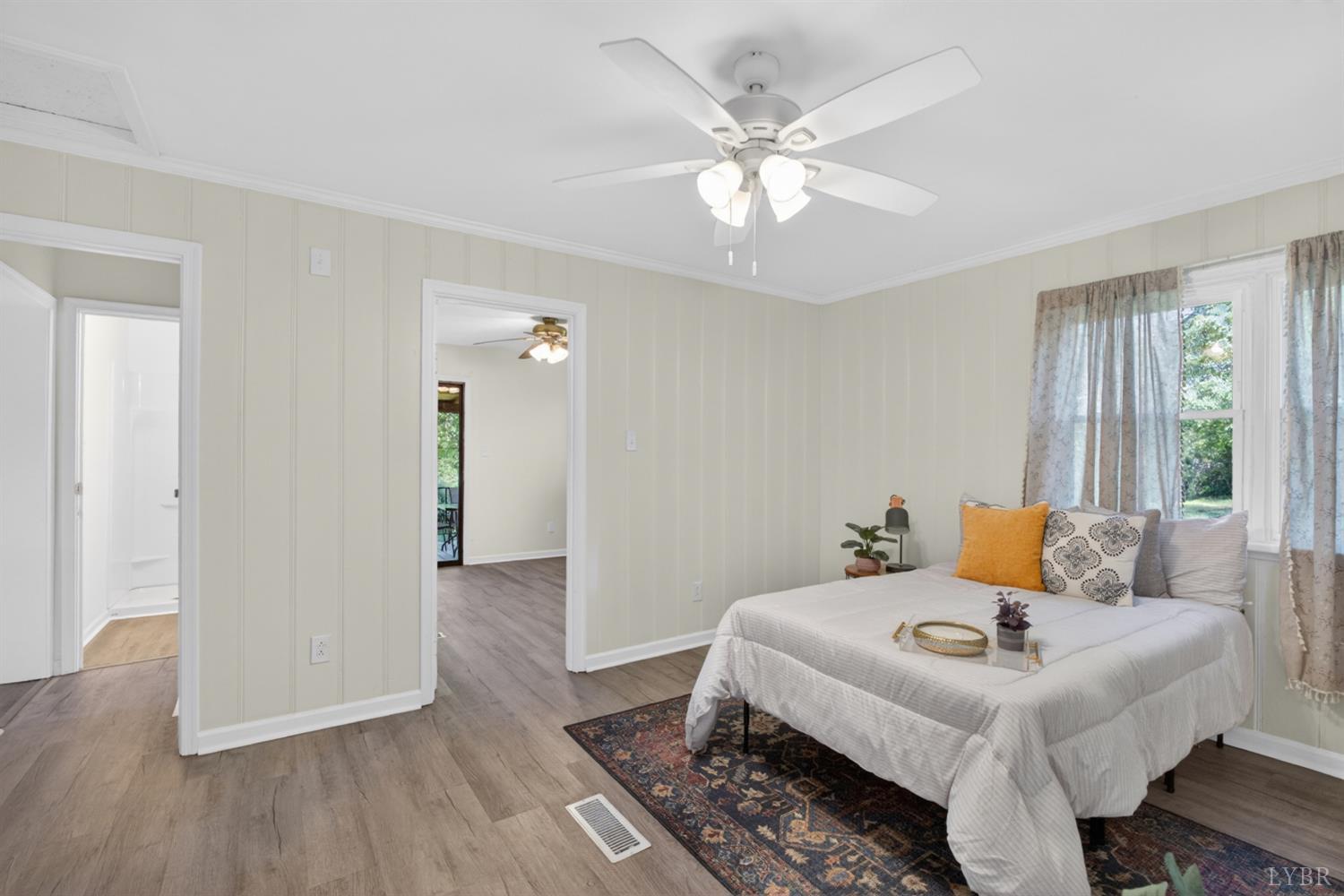 151 Brooks Street Monroe, VA 24574 - Photo 20 of 42 a living room with furniture and a chandelier