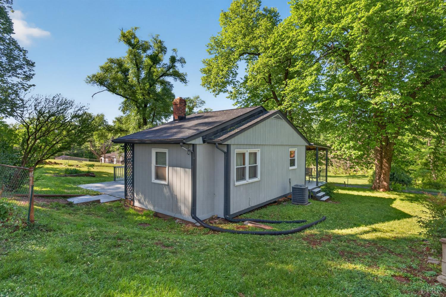 151 Brooks Street Monroe, VA 24574 - Photo 26 of 42 a house view with a garden space