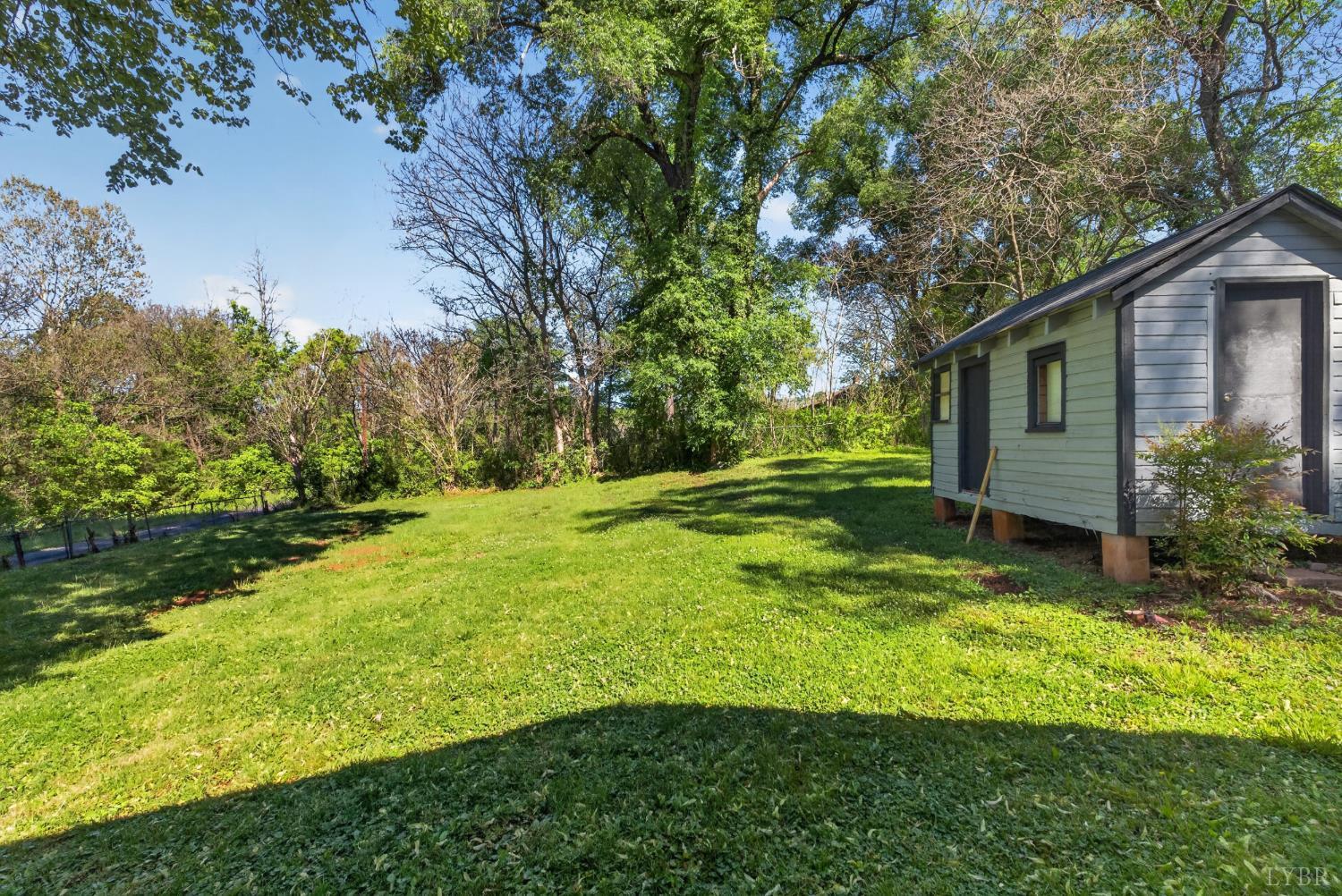 151 Brooks Street Monroe, VA 24574 - Photo 35 of 42 a view of a house with a yard