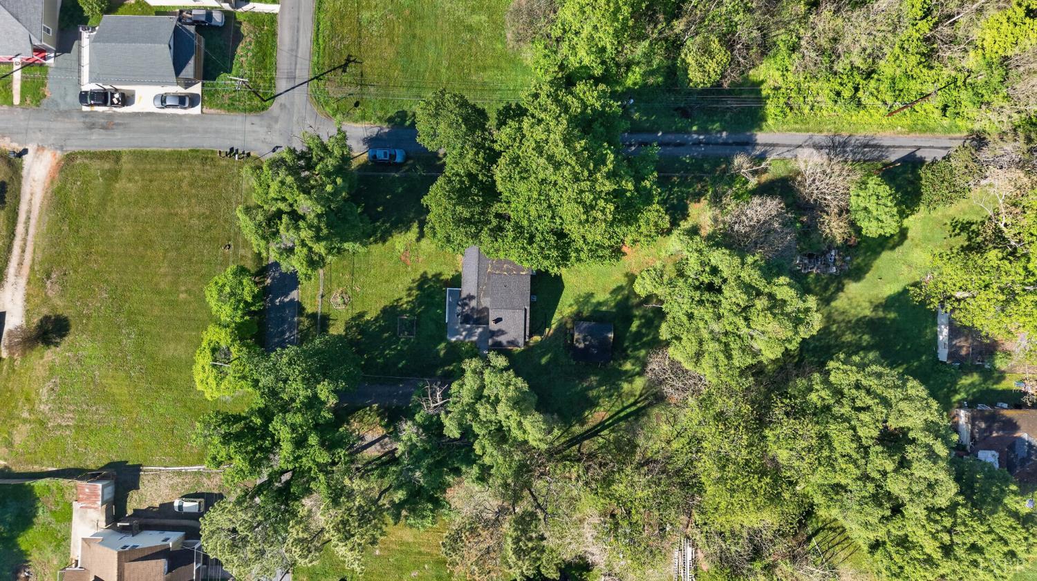 151 Brooks Street Monroe, VA 24574 - Photo 41 of 42 an aerial view of residential house with outdoor space and trees all around