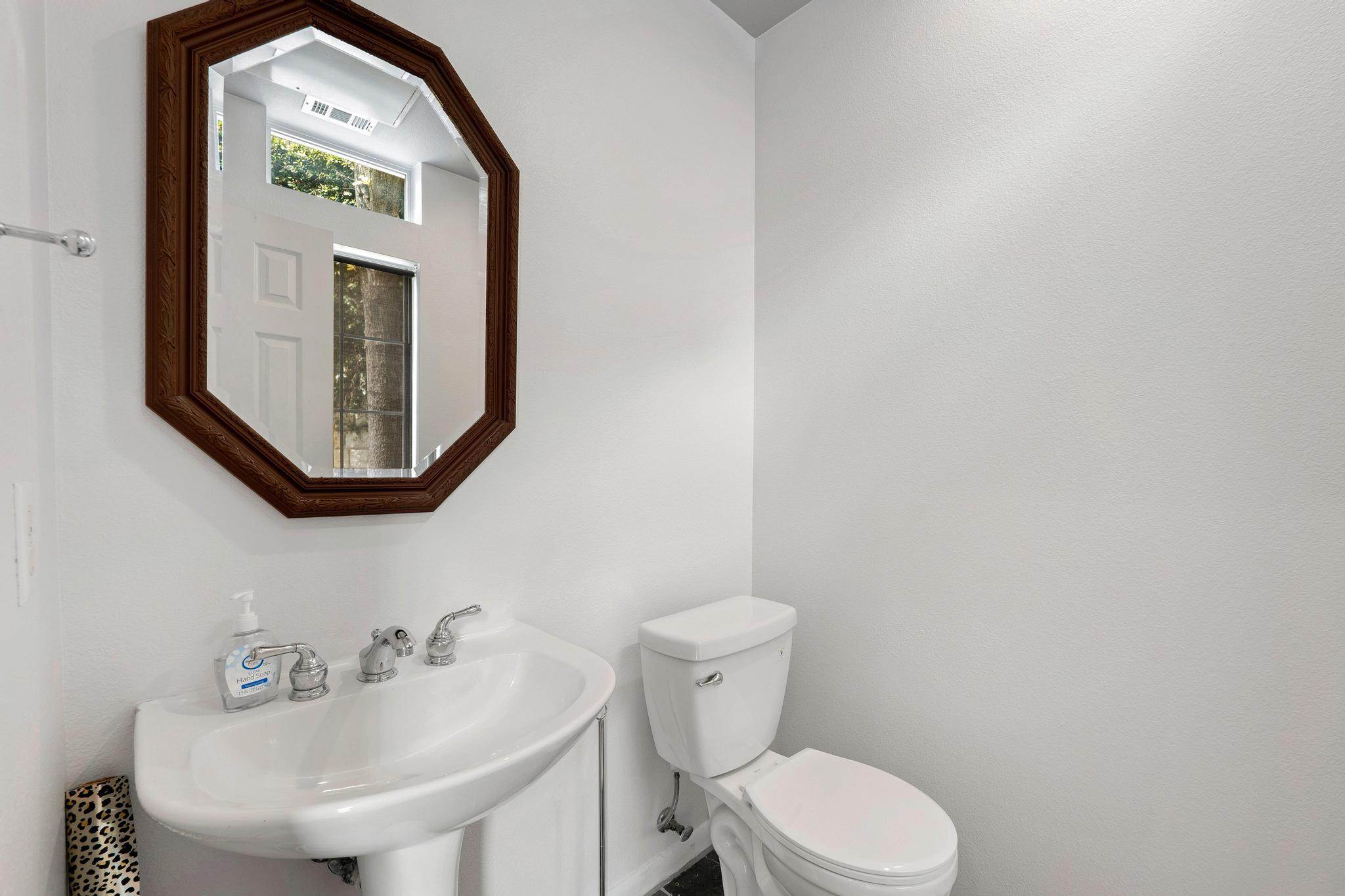 2918 Ranch Road 620, Unit J162 Austin, TX 78734 - Photo 17 of 26 Half bath with Pedestal sink