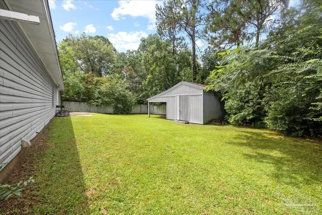 a view of a backyard with a garden