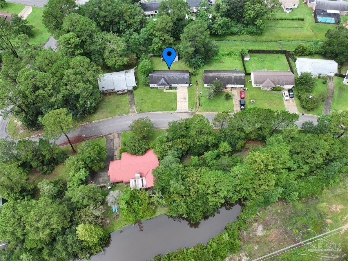 8617 Blue Jay Way Pensacola, FL 32534 - Photo 28 of 28 an aerial view of a house with pool outdoor seating and yard
