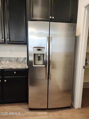 a shelf with cup and plates