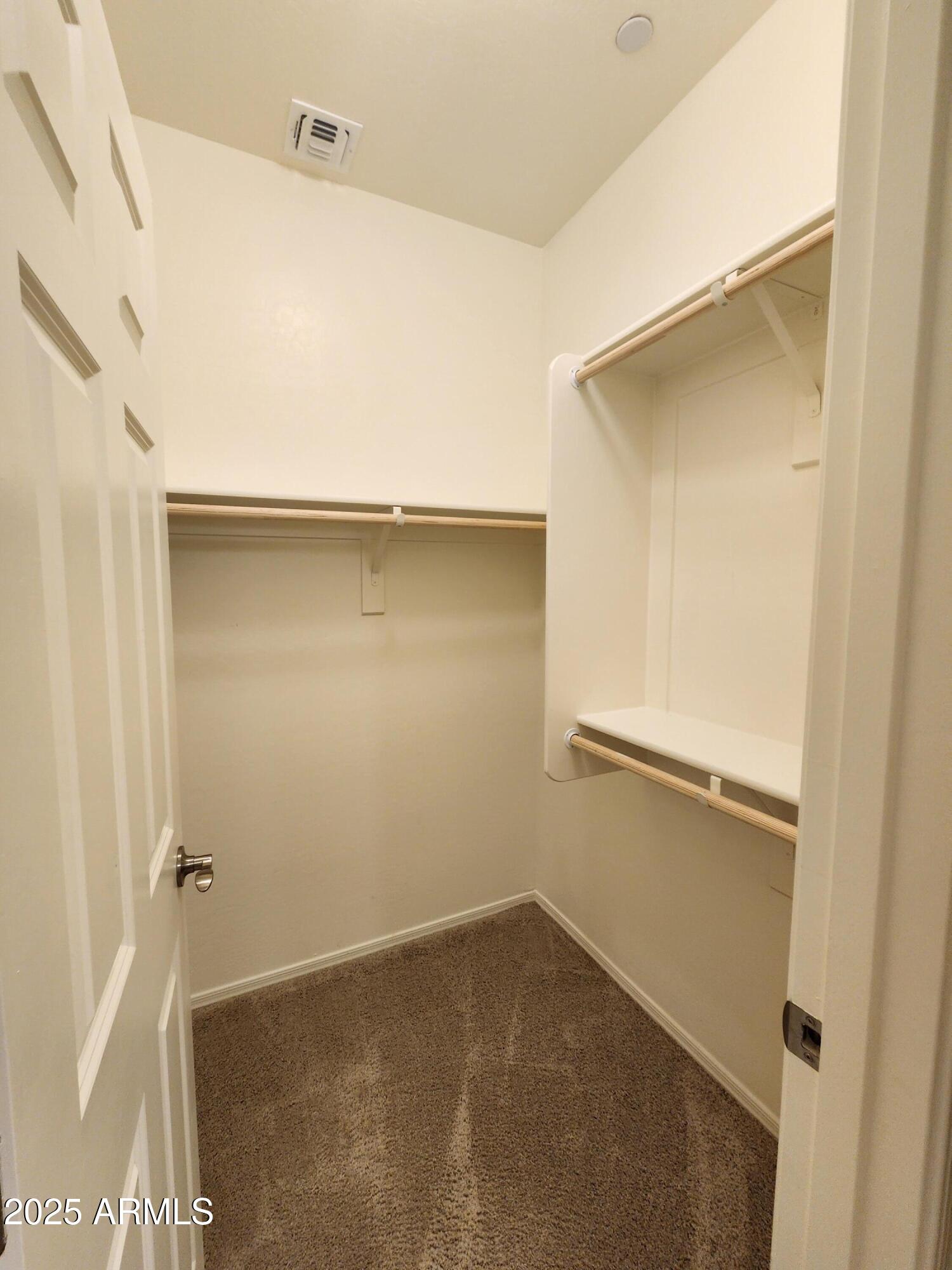 14870 West Encanto Boulevard, Unit 1113 Goodyear, AZ 85395 - Photo 24 of 33 a view of an empty room