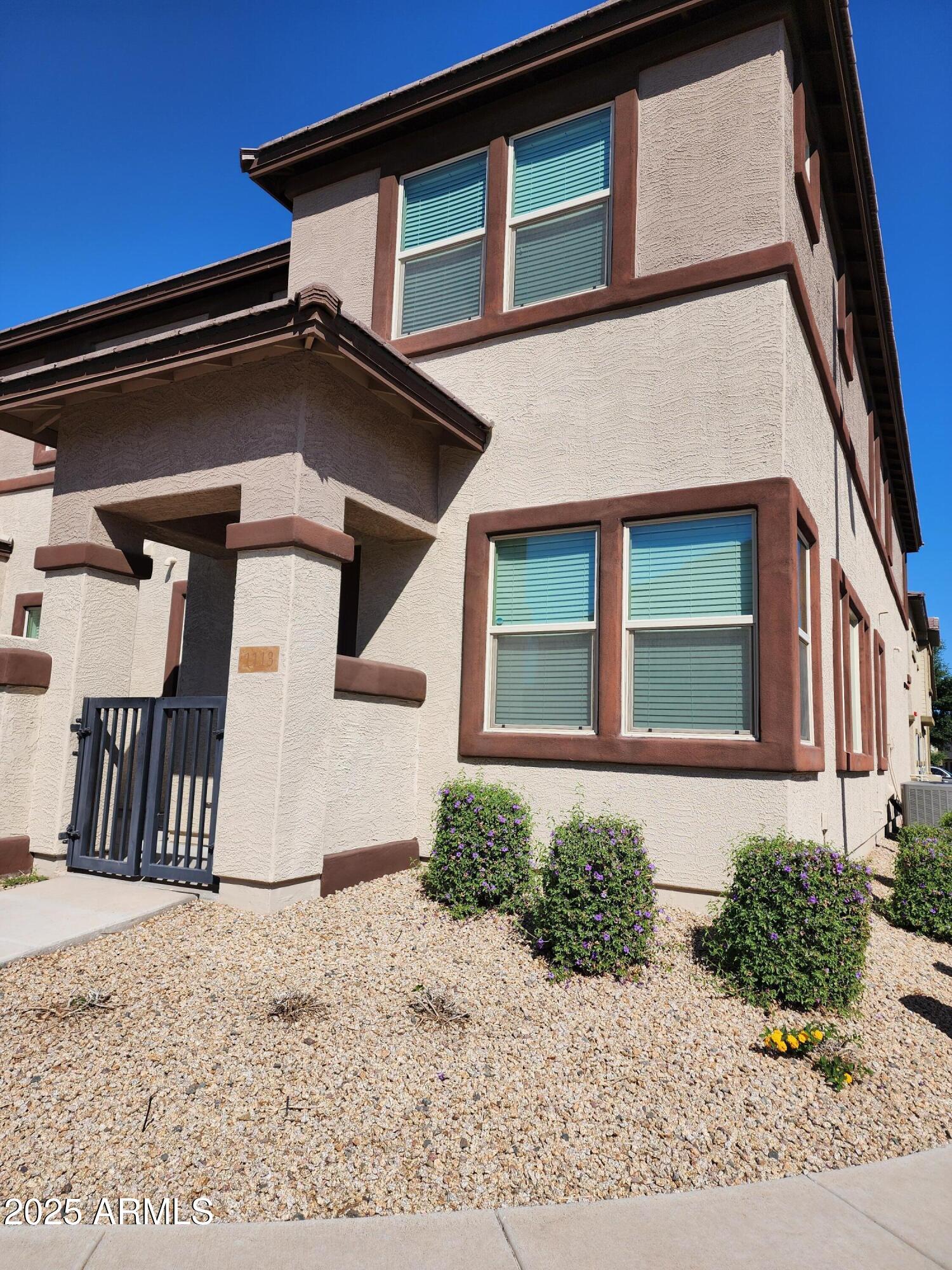 14870 West Encanto Boulevard, Unit 1113 Goodyear, AZ 85395 - Photo 3 of 33 a front view of a house