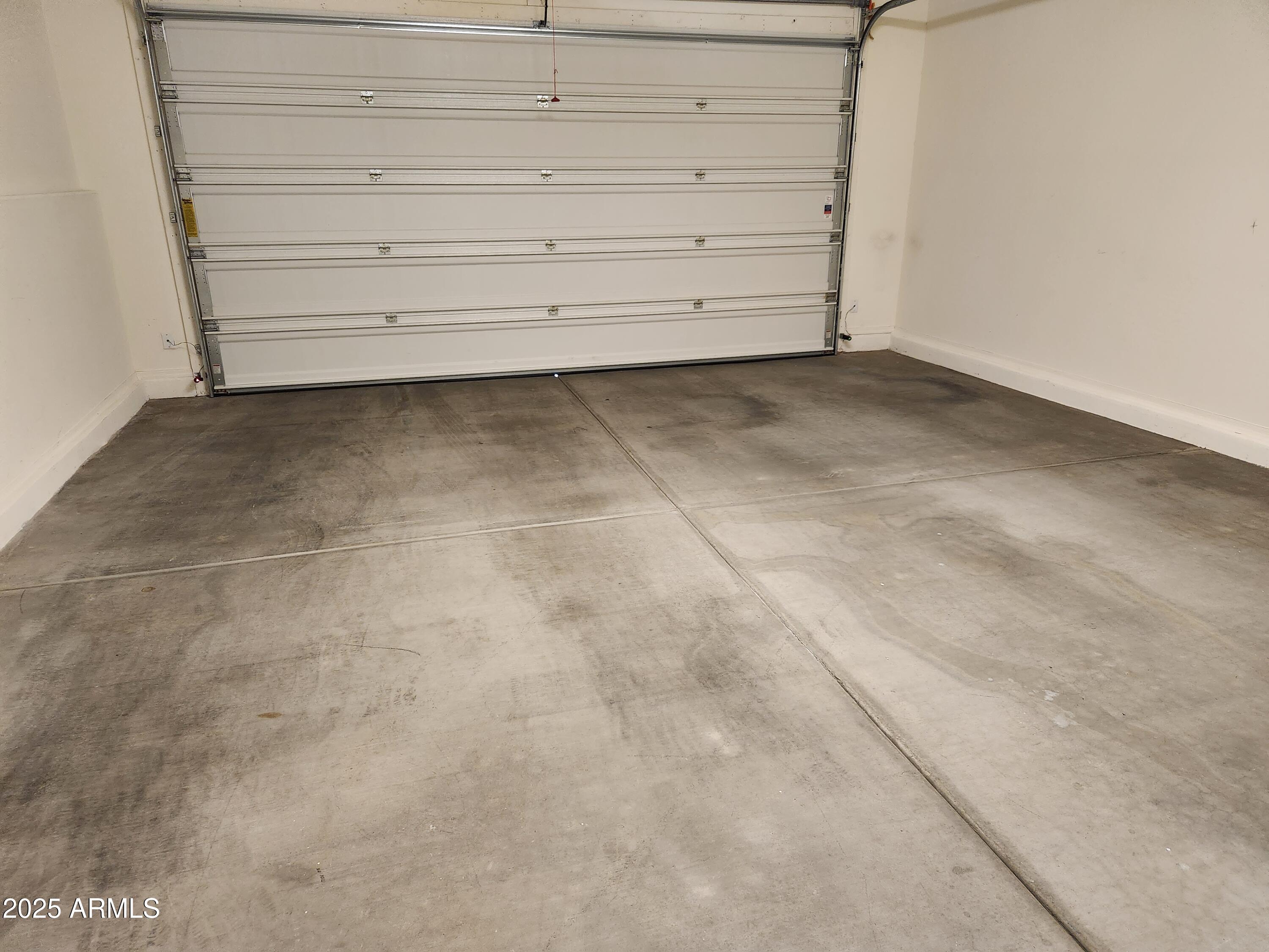 14870 West Encanto Boulevard, Unit 1113 Goodyear, AZ 85395 - Photo 9 of 33 a view of an empty room