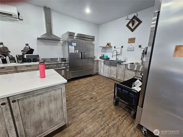 a view of a large building with a mountain in the background