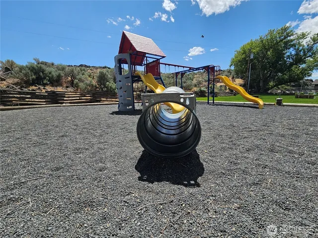 a view of park with kids yard