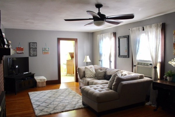 145 Springfield Street Springfield, MA 01107 - Photo 8 of 22 a living room with furniture and a rug