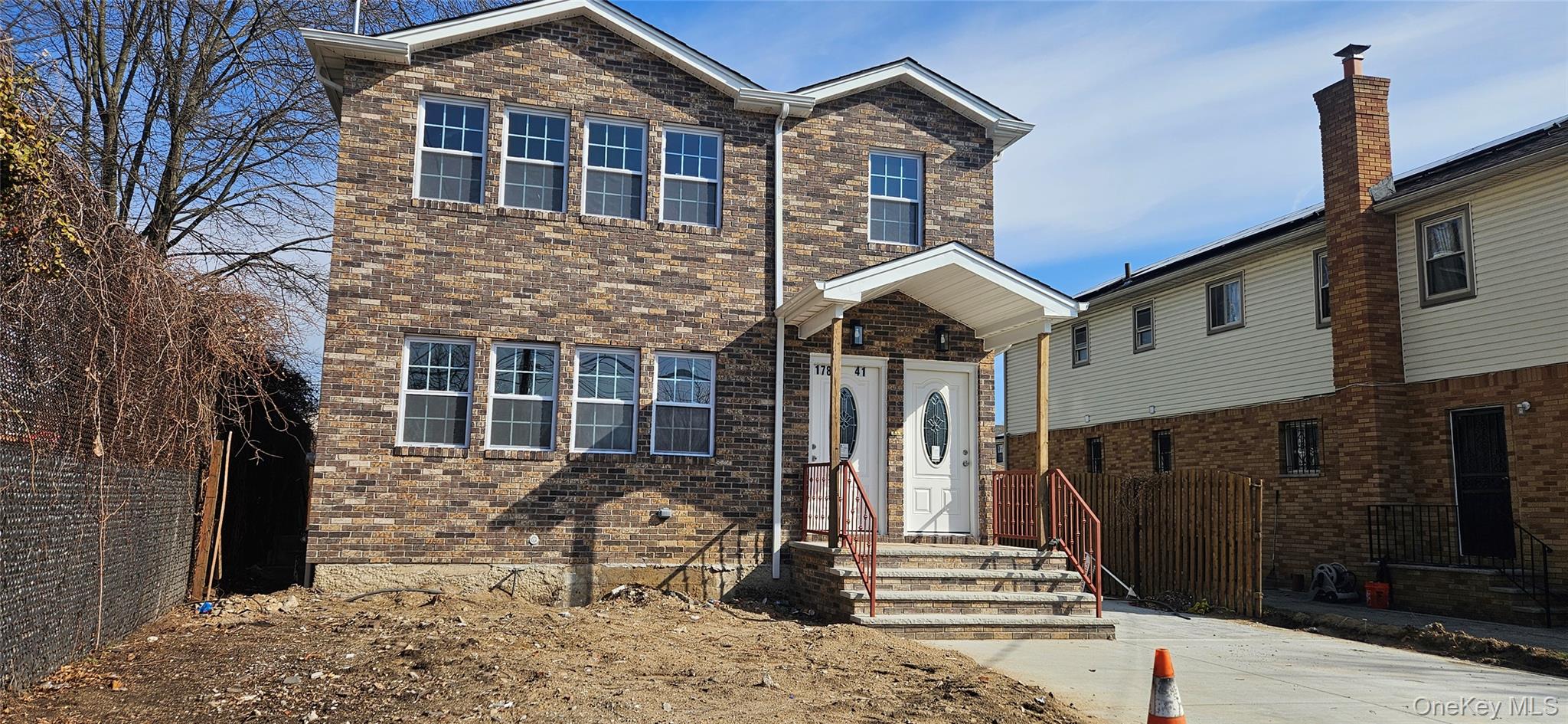 178-41 146th Terrace Queens, NY 11413 - Photo 23 of 23 a front view of a house with stairs