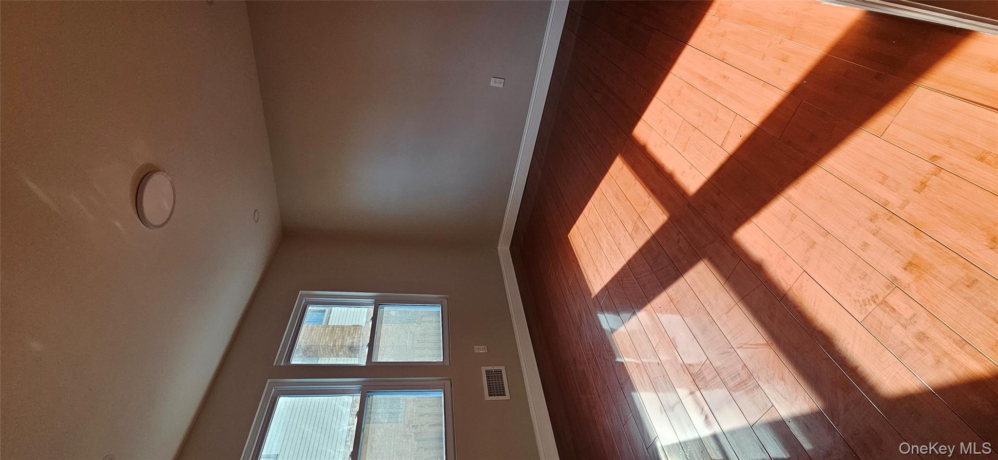 178-41 146th Terrace Queens, NY 11413 - Photo 6 of 23 a view of an empty room and window