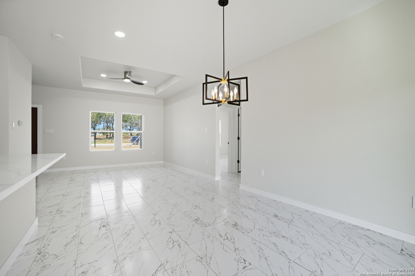 16724 Tapatio Street Atascosa, TX 78002 - Photo 12 of 29 a view of a hallway with a window