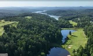 a view of a big yard with a house