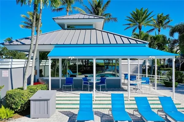 a view of a balcony with an ocean