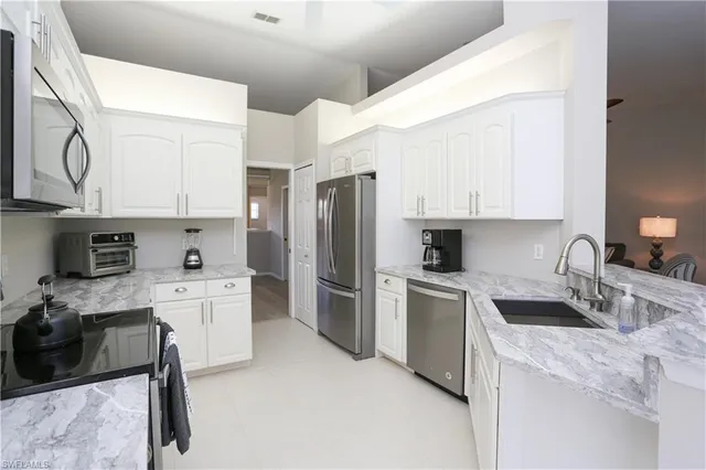 $8,000 | 5636 Whisperwood Boulevard, Unit 1704, Naples, FL 34110