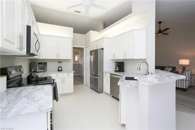 $8,000 | 5636 Whisperwood Boulevard, Unit 1704, Naples, FL 34110